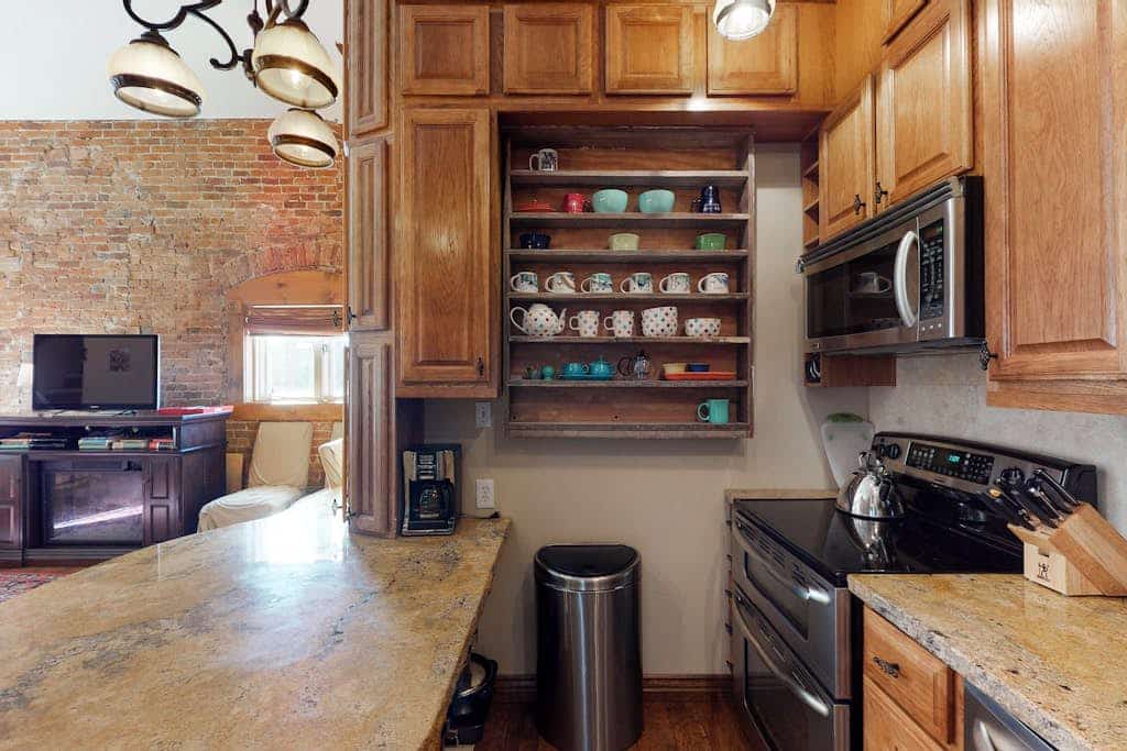 Stylish, downtown condo w/ loft, kitchen, & fireplace plus shared patio & grill