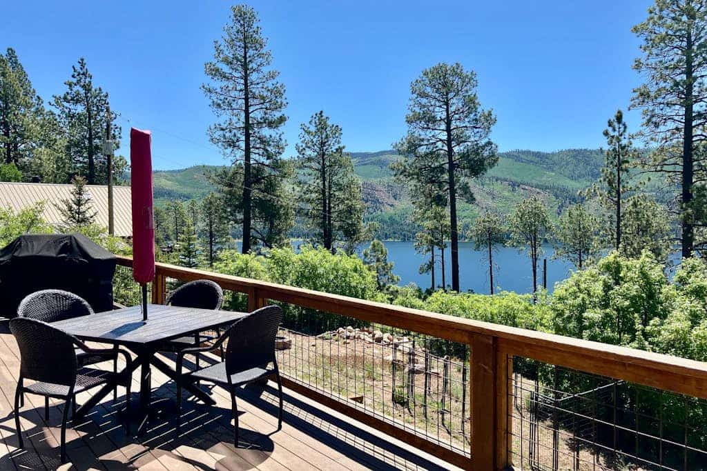 Amazing lake view home with fireplace, W/D, kitchen, grill, balcony, and deck