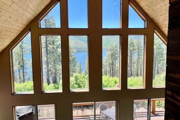 Amazing lake view home with fireplace, W/D, kitchen, grill, balcony, and deck