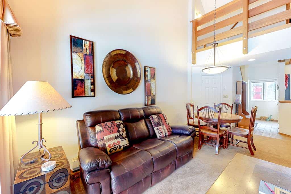 Two-story condo with a hot tub, WiFi, & wood-burning fireplace