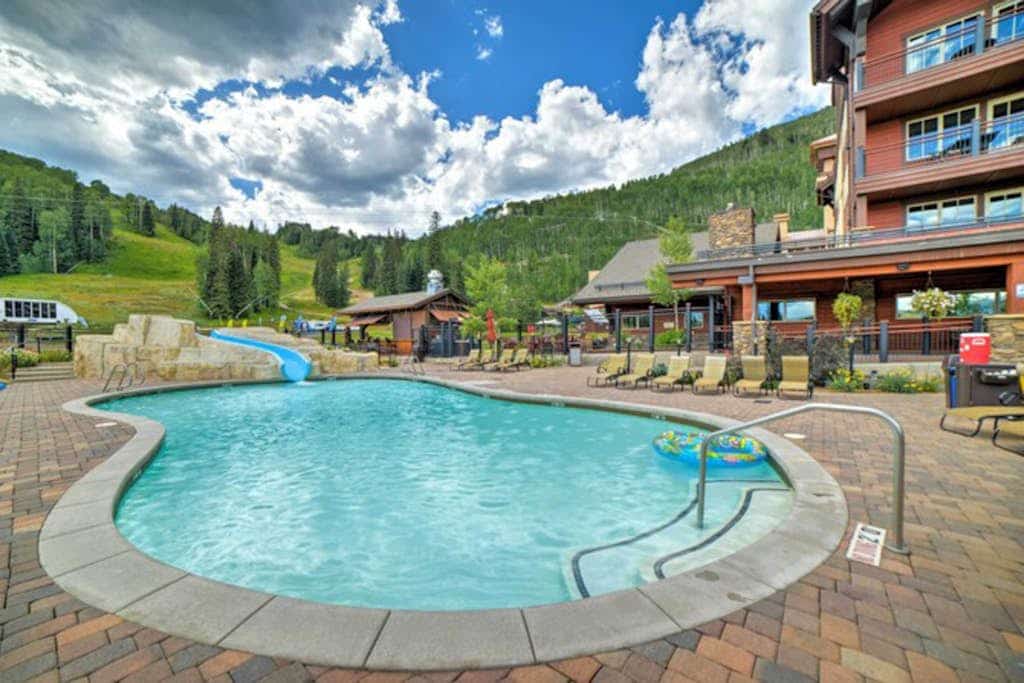 Ski-in/out condo with pool, fitness center, lake & mountain views