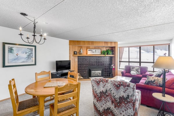 Comfortable condo with ski lift views, shared fitness room, gas fireplace, & W/D