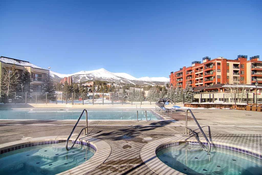 Mountain view condo with pool & hot tubs - walk to lifts, historic Main Street