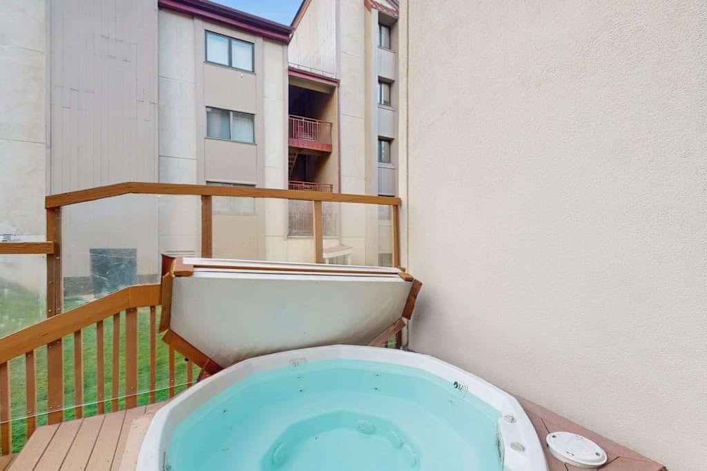 Dog-friendly, ski condo with golf course views, balcony, hot tub & sauna