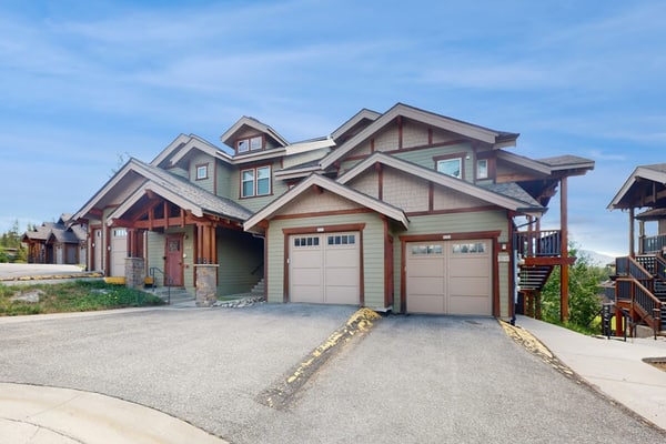 Mountain-view condo on ski shuttle route with deck & fireplace