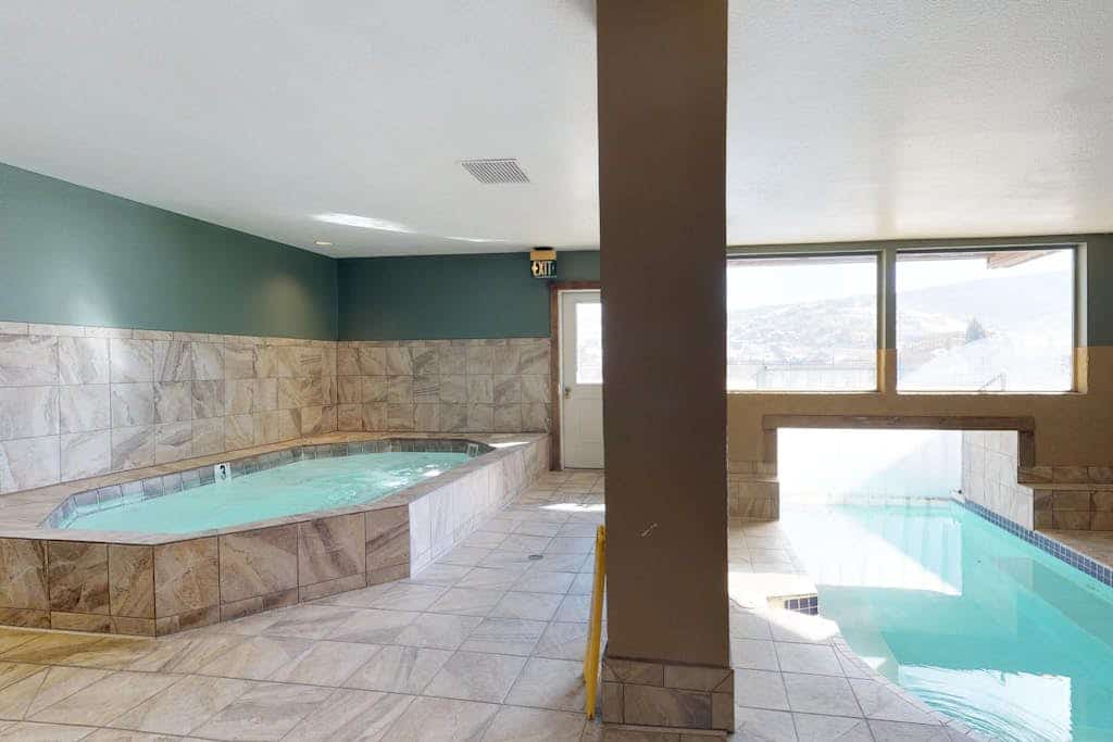 3rd-floor condo with balcony, indoor & outdoor pools, game room, gym, W/D
