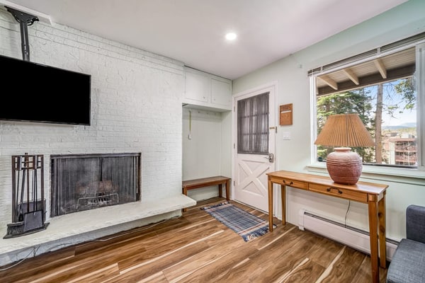 Second-floor condo with fireplace, hot tub & indoor pool - dog-friendly