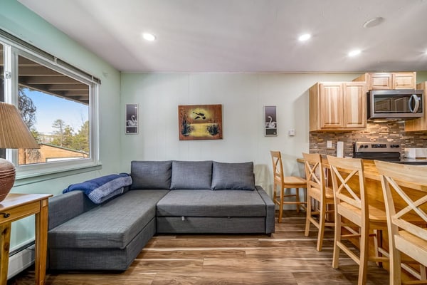 Second-floor condo with fireplace, hot tub & indoor pool - dog-friendly