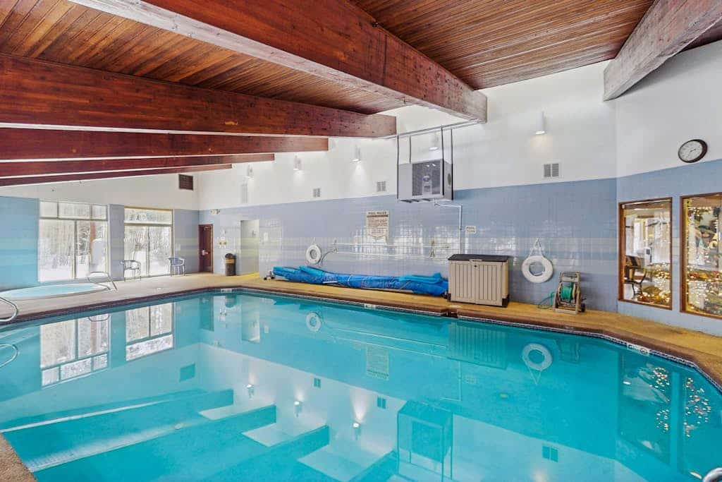 Bright, welcoming condo with pool, hot tub, gas fireplace, fitness room, balcony