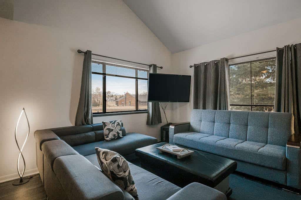 Two-Level Condo w/ Mountain View, Wood Stove, WiFi, Laundry & Central Location
