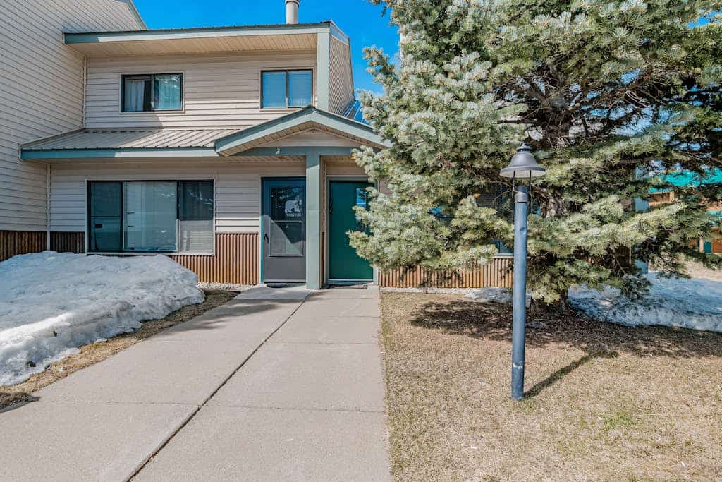 Two-Level Condo w/ Mountain View, Wood Stove, WiFi, Laundry & Central Location