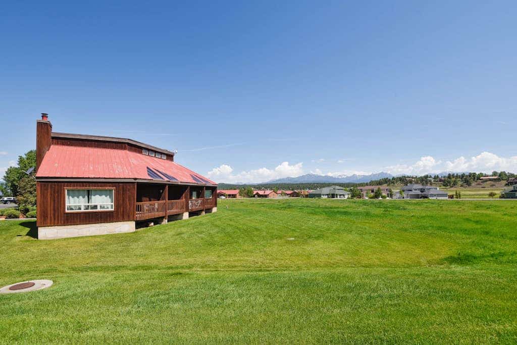 Dog-friendly condo w/ covered porch & views - near golf, lakes & ski