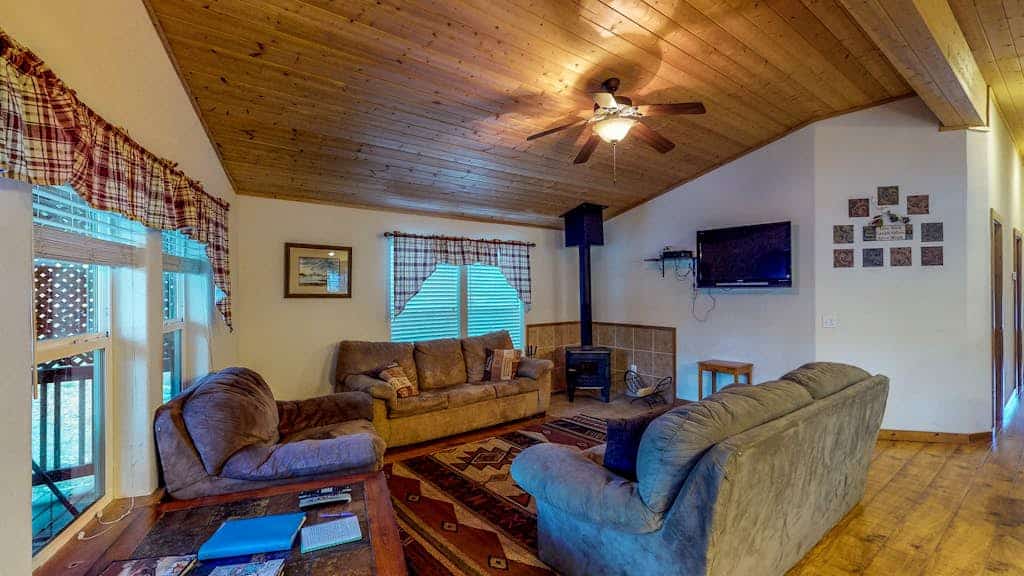 Waterfront cabin with private hot tub, furnished deck, wood stove, & free WiFi