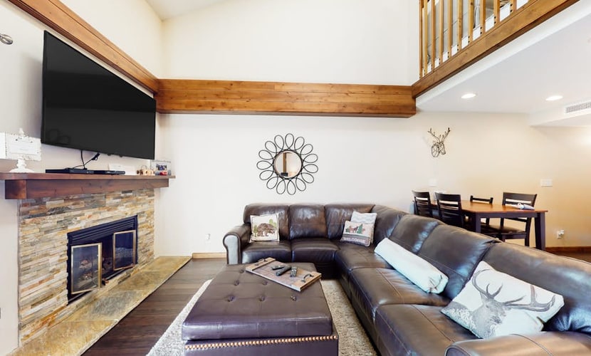 Peaceful condo with balcony, loft, shared sauna, & fireplace
