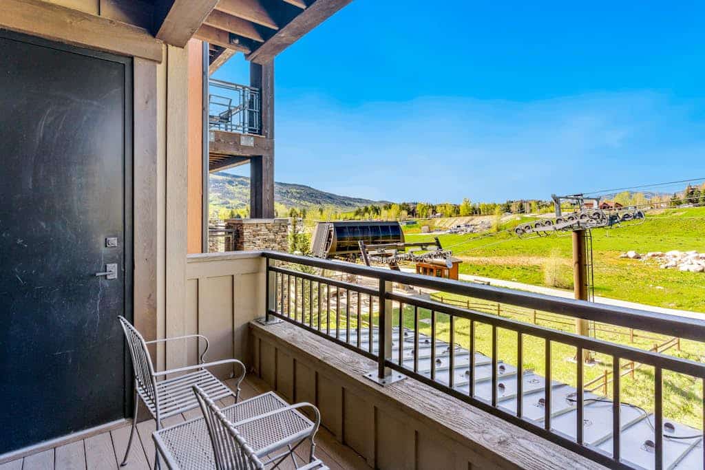 Condo with two balconies, fireplace, on-site gondola, pool & three hot tubs