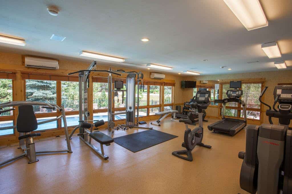Second floor condo with gas fireplace, WiFi, pool, and hot tub - walk to gondola