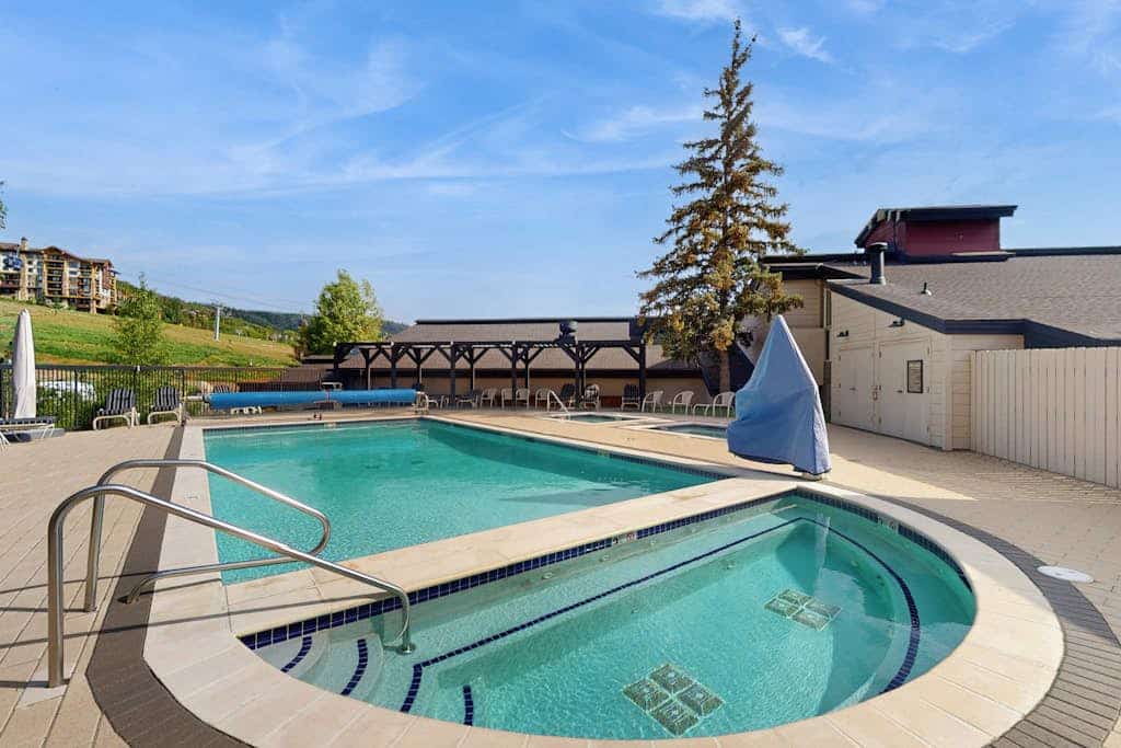 Ski-in/ski-out condo with mtn. & city views, central AC, & shared hot tub