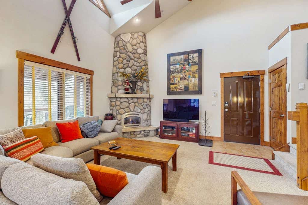 Condo on the Bus Route w/ Deck, Fireplace, WiFi, Garage & 2 Shared Hot Tubs