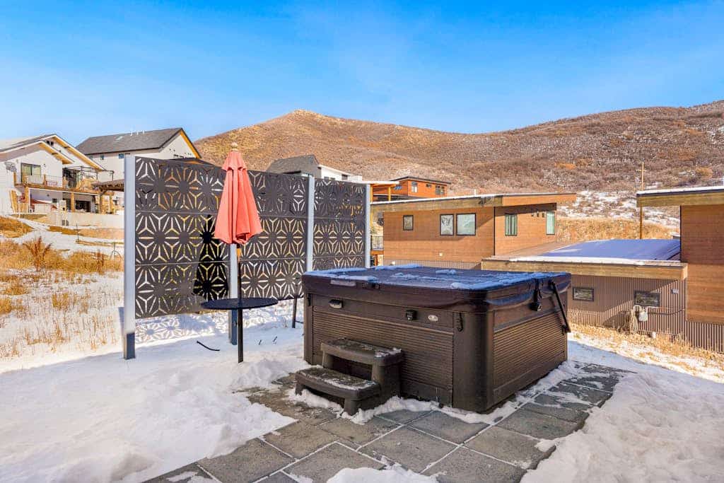 Open & attractive home with WiFi, W/D, fireplace, & large, private hot tub