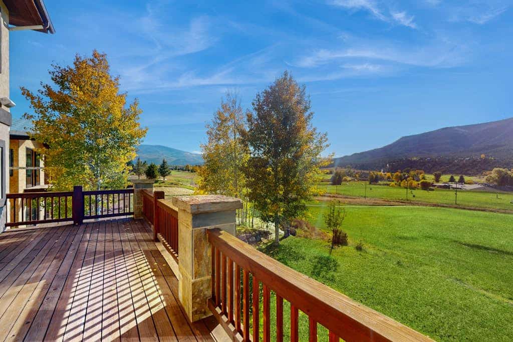 Luxe home on Gypsum Creek Golf Course with fireplace and mountain views