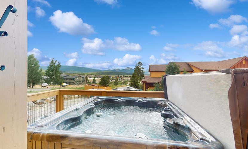 Welcoming condo with private hot tub, gas grill, and easy access to bus to slope