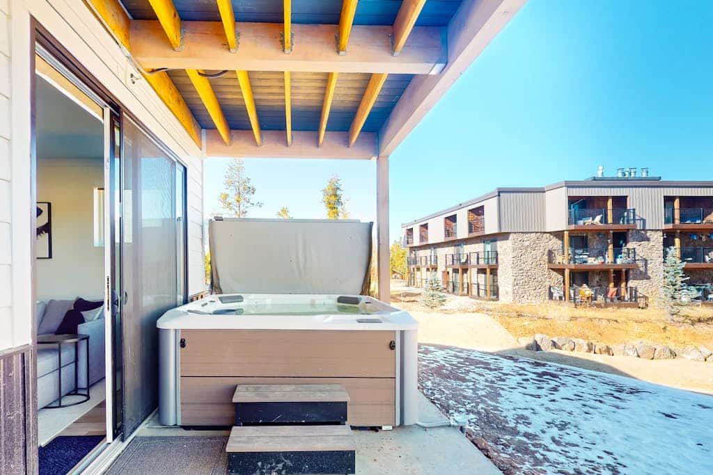 Ground-floor condo with private hot tub & heated 1-car garage with EV charger