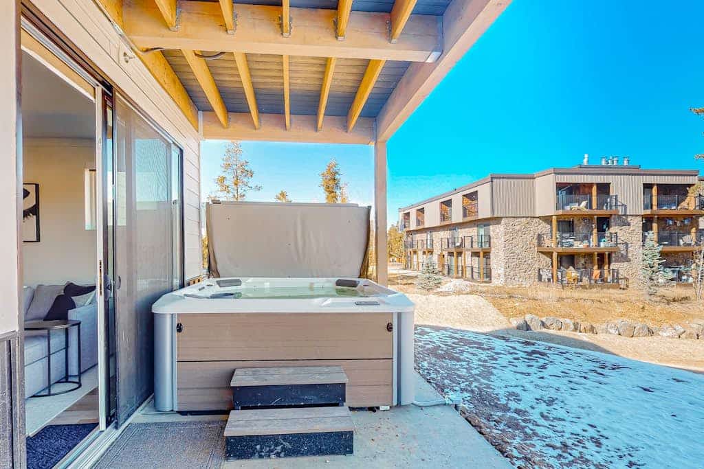 Mountain-view condo with private hot tub & heated 1-car garage with EV charger