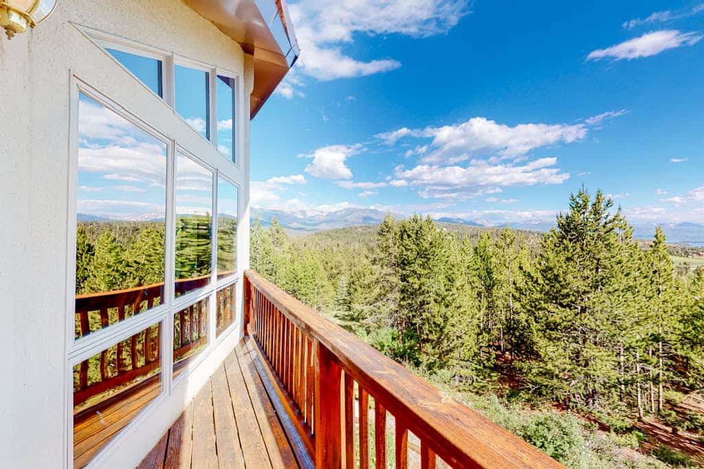 Gorgeous home with a stunning lake & mountain view, deck & gas fireplace