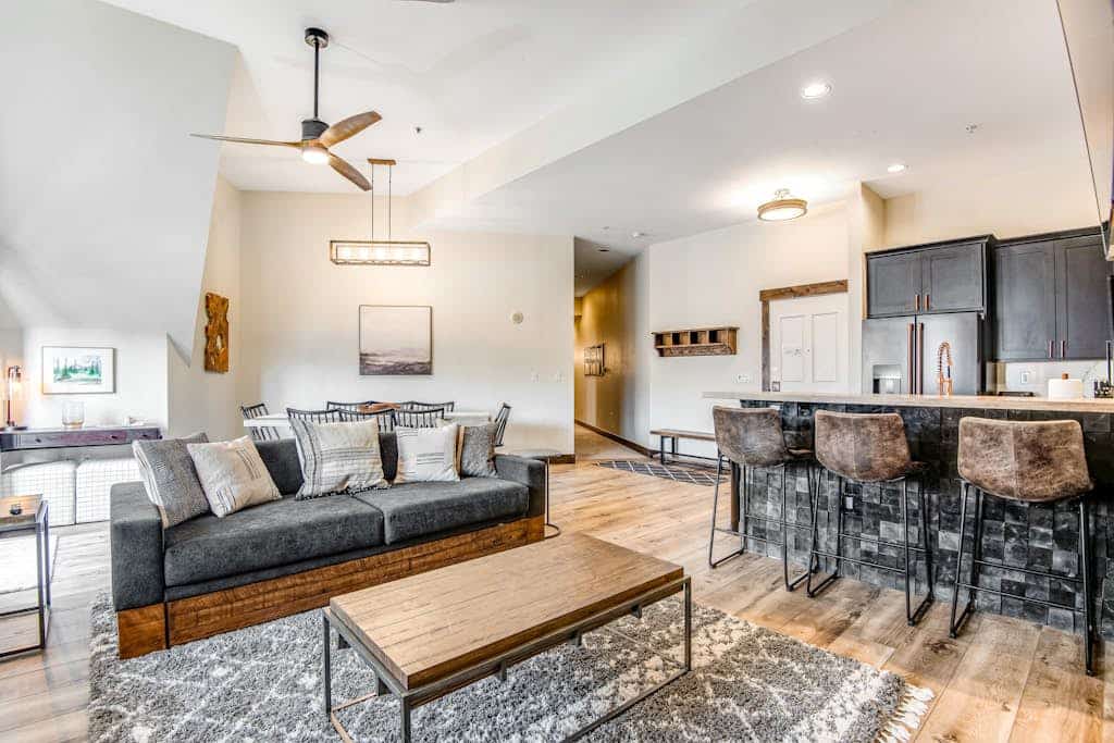 Fifth-floor condo with river views, hot tubs, pool & gym - walk to Peak 9 lifts