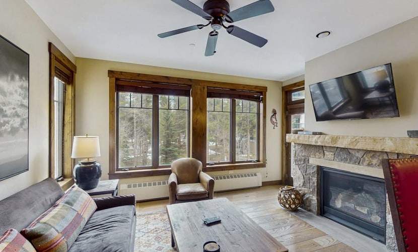Luxury ski condo steps from QuickSilver Lift with pool, hot tubs & gym