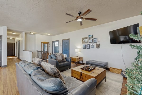 Mountain getaway with hot tub, game room, fireplace, and modern interior