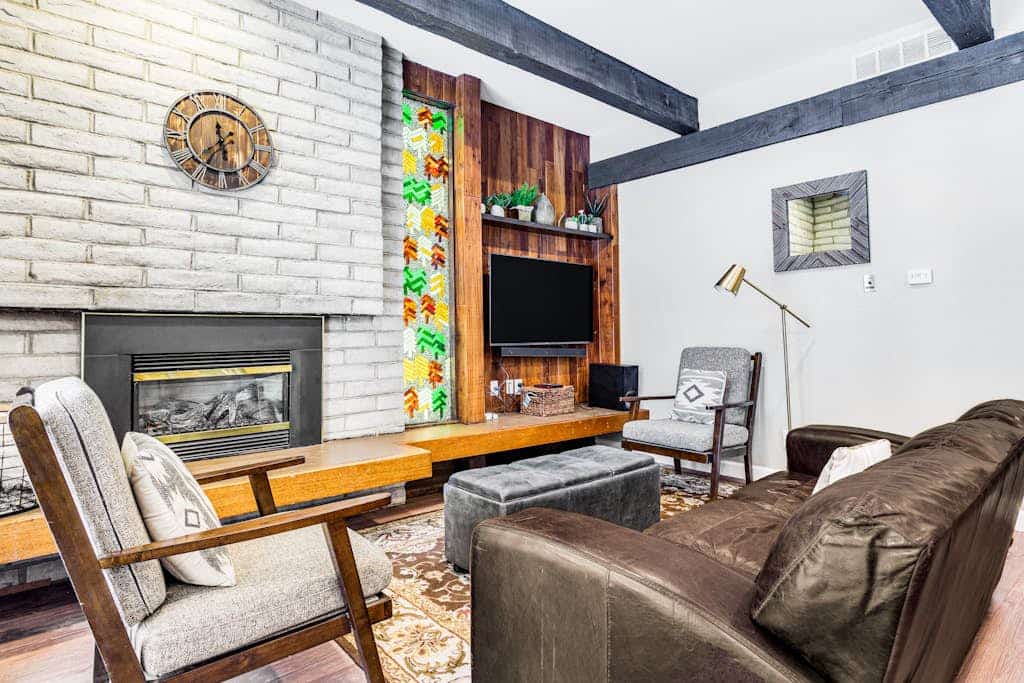 Mountain condo with fireplace, patio, pool, & hot tubs - walk to lifts/Main St
