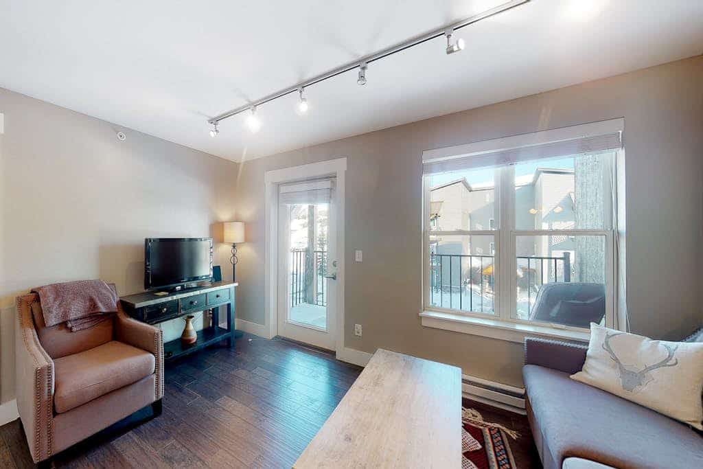Comfortable condo with sweeping mountain views, private balcony, & washer/dryer