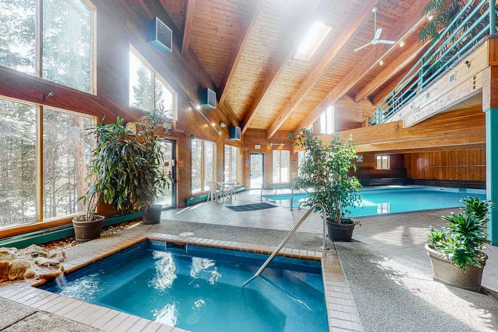 Luxurious top-floor condo with balcony, WiFi, fireplace, great views, & location