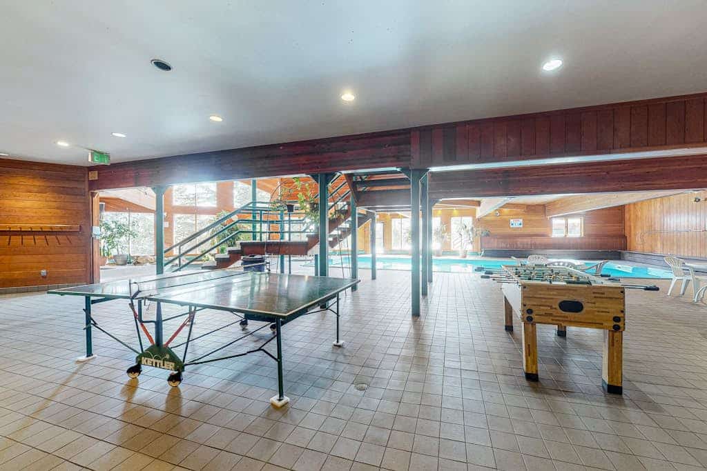 Luxurious top-floor condo with balcony, WiFi, fireplace, great views, & location