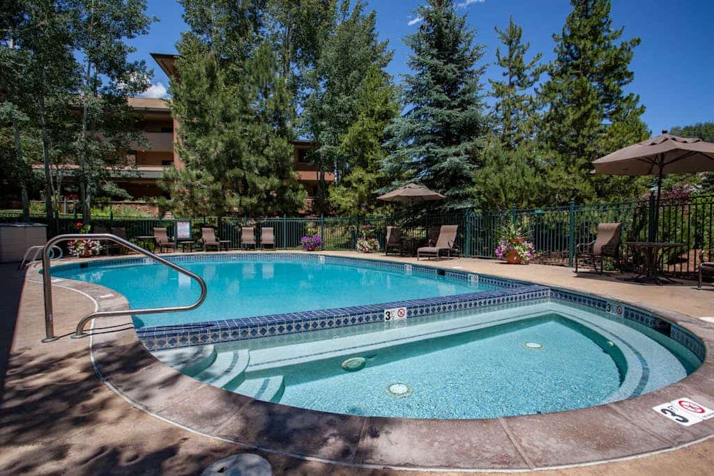 Top-floor mountain condo w/ a shared, heated pool, hot tub, & fitness room
