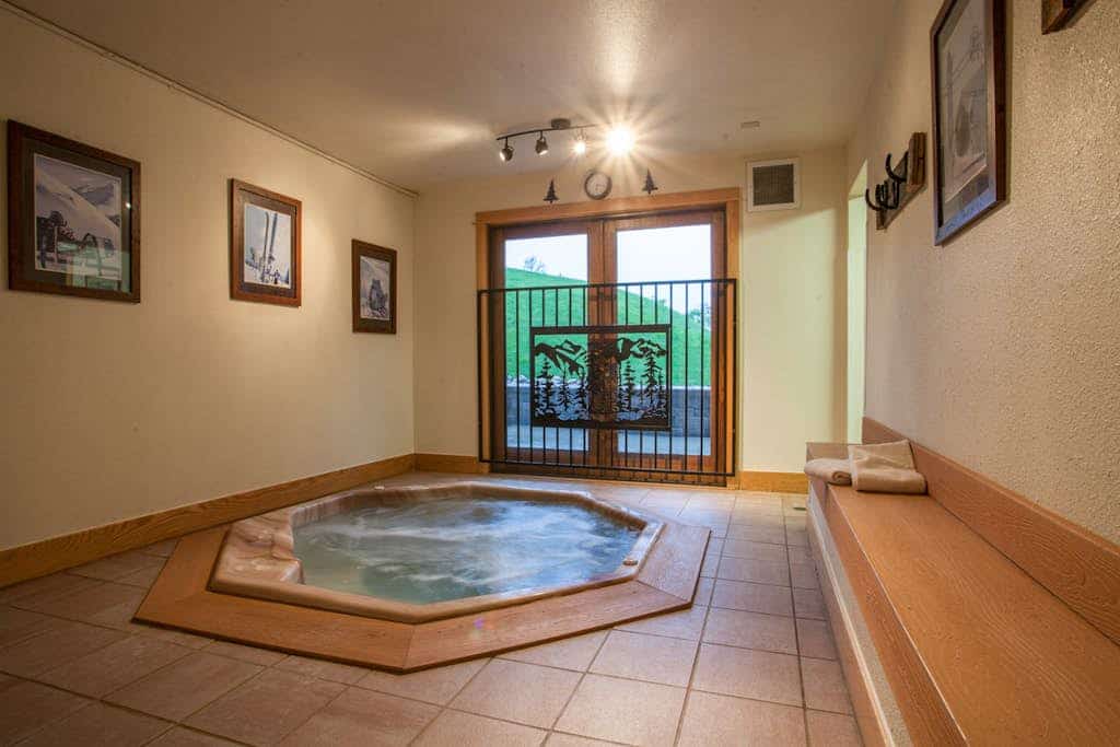 Quaint, ski-in/ski-out retreat w/ shared hot tub, sauna, and fenced-in backyard