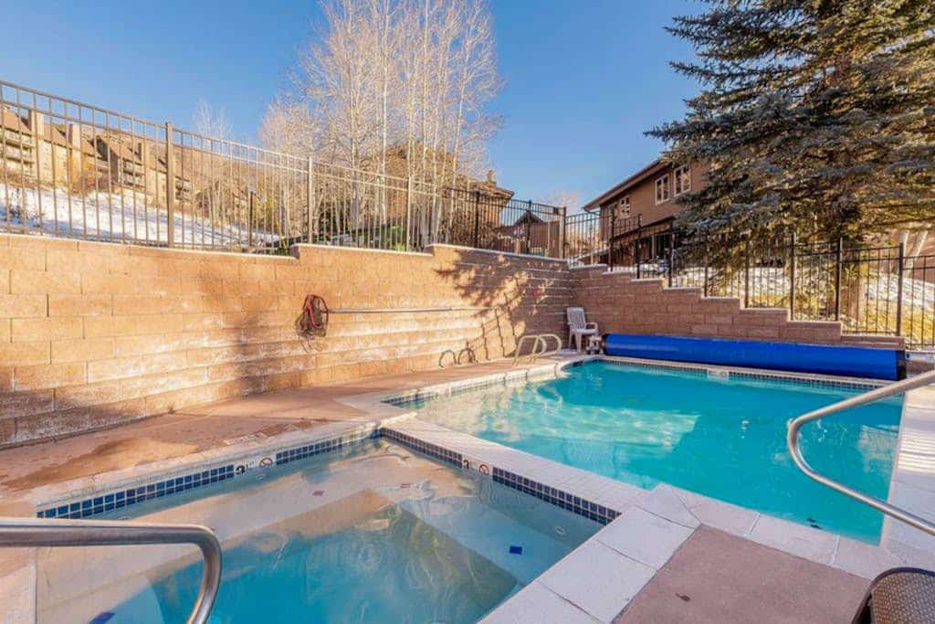 Two-story condo with ski view, pool, hot tub & gas fireplace - ski/walk to lifts