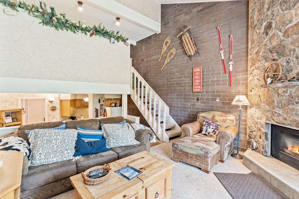 Ski-in/ski-out mountain view condo with gas fireplace, hot tubs, & fitness room