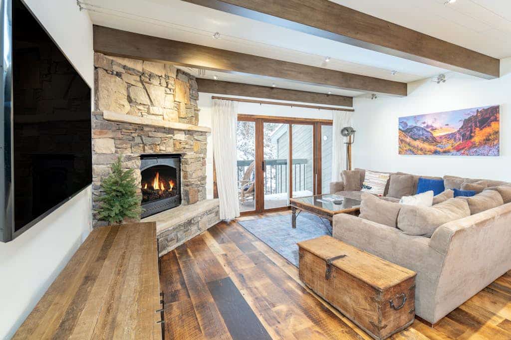Mountain- & river-view condo with W/D & hot tub - walk to lifts & Main St
