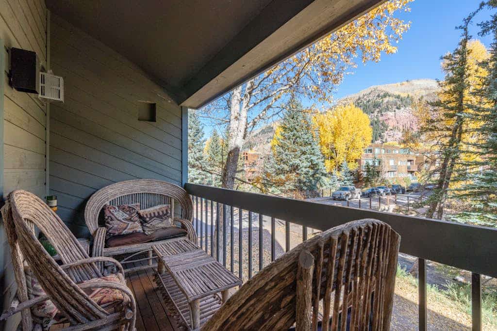 Mountain- & river-view condo with W/D & hot tub - walk to lifts & Main St