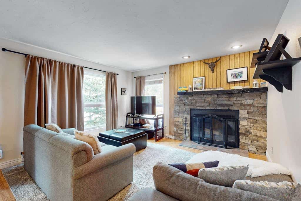 Riverfront condo with mountain views - close to conveniences & the slopes