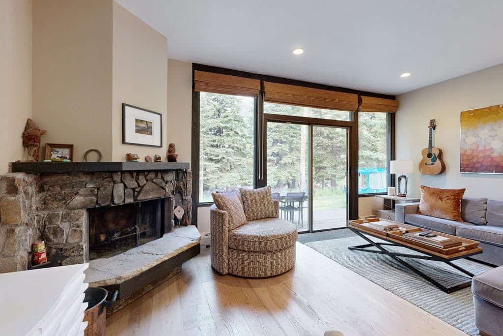 Colorful Riverfront Chalet  with Shared Pool and Hot Tub - Close to Ski Slopes