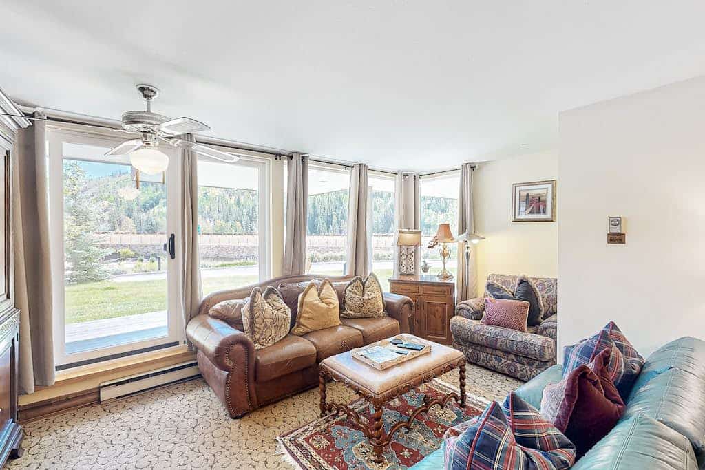 Charming condo with resort amenities, sweeping views, & wood-burning fireplace