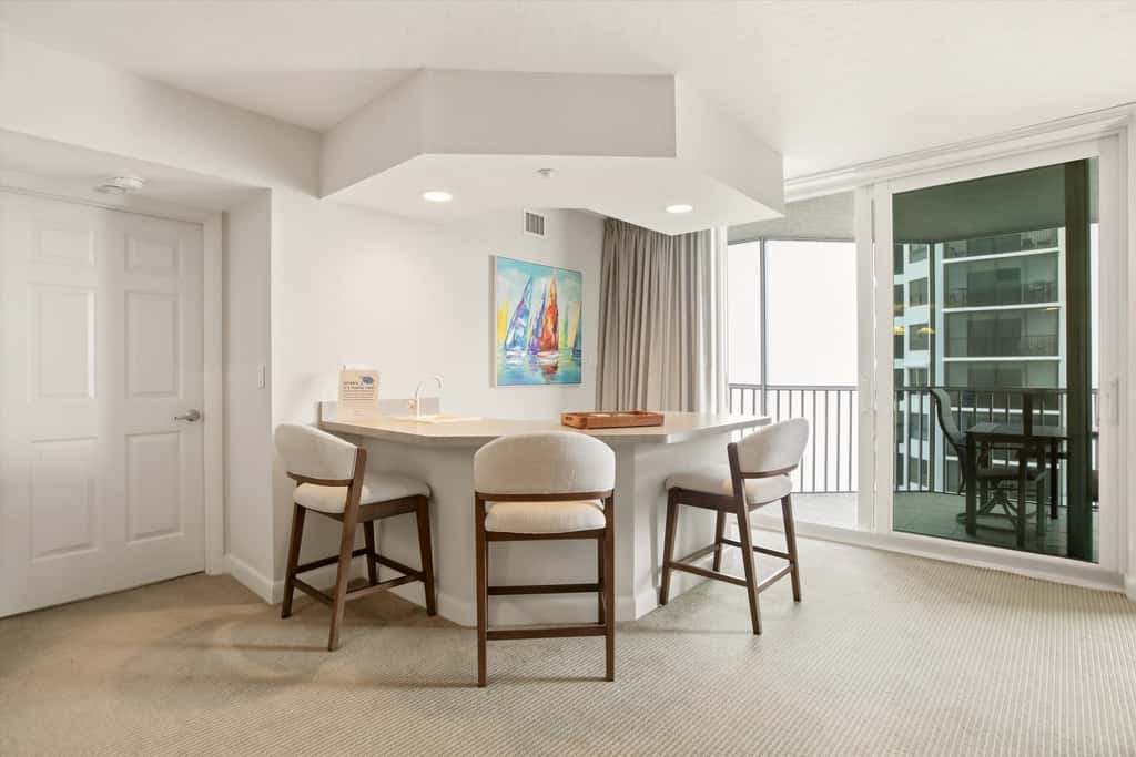 Beachfront Bliss, Cozy Condo with Patio, Pool & Stunning Views!