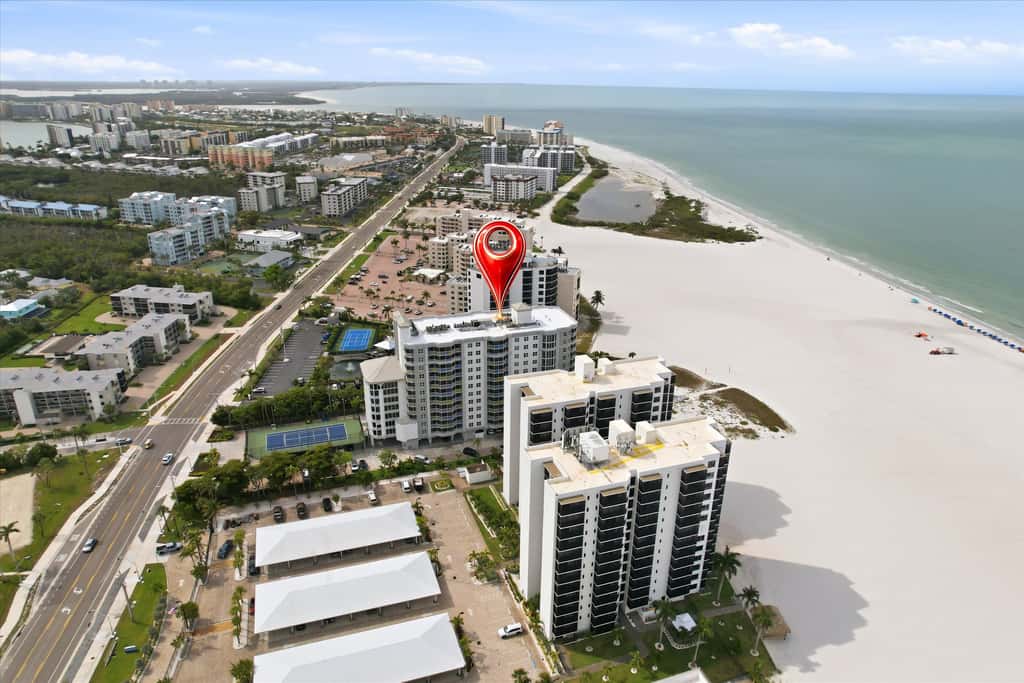 Beachfront Bliss, Cozy Condo with Patio, Pool & Stunning Views!