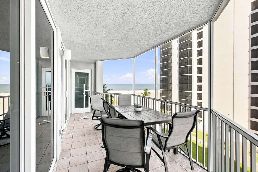 Beachfront Bliss, Cozy Condo with Patio, Pool & Stunning Views!