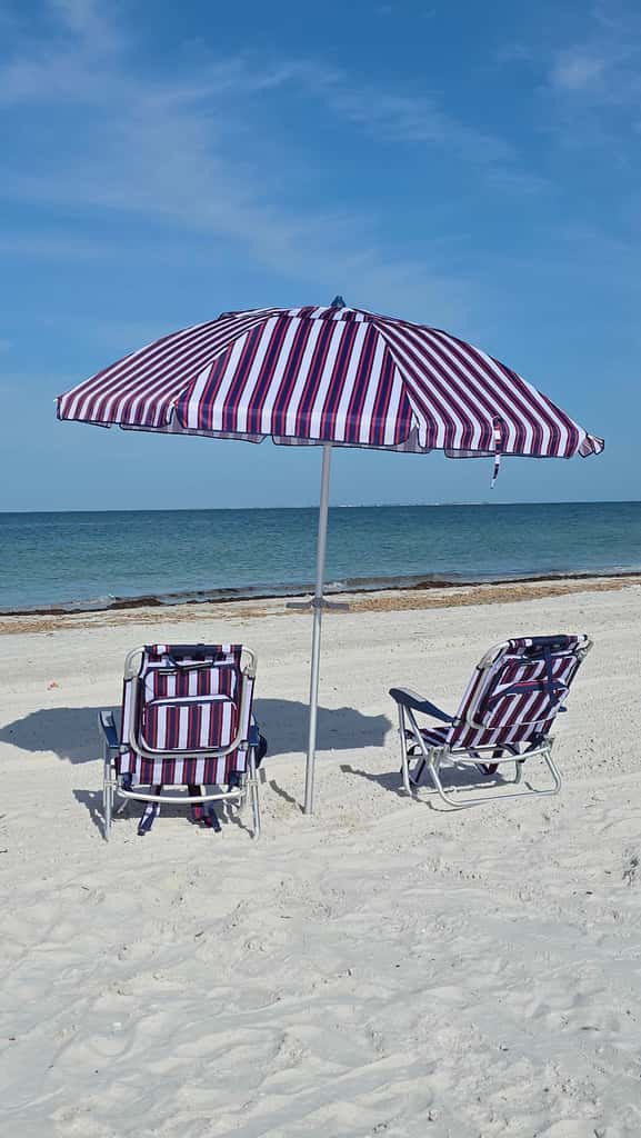 Beachfront Bliss, Cozy Condo with Patio, Pool & Stunning Views!