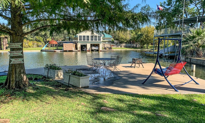 Charming dog-friendly lakefront home with lake view, dock, & washer/dryer