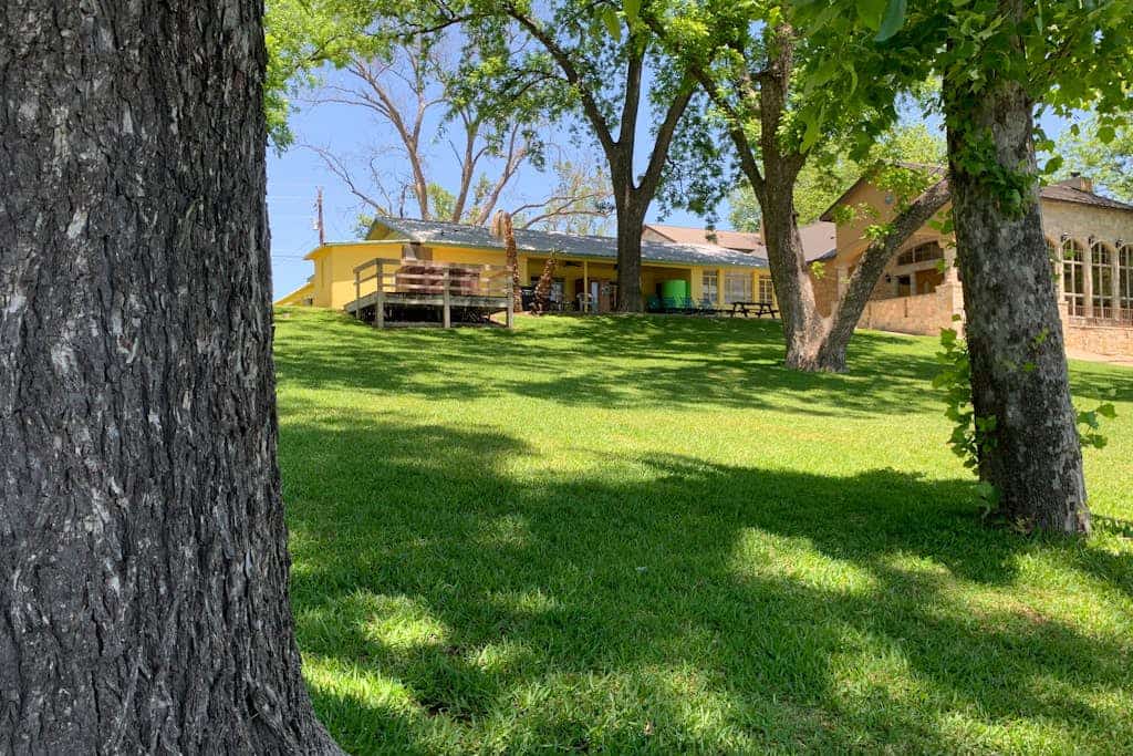 Lakefront dog-friendly home with central AC, dock, scenic patio and two kayaks